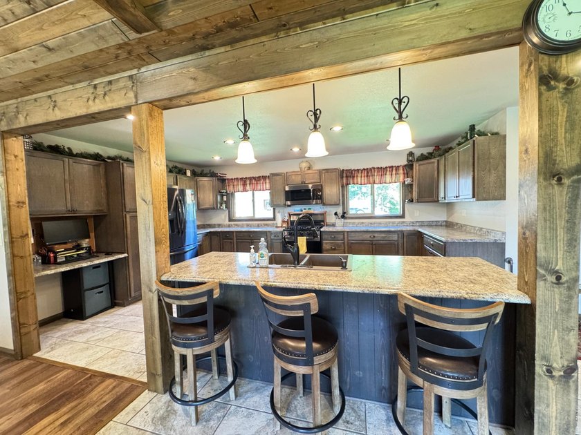 Move right into this waterfront home on the Rhinelander flowage - photo 4