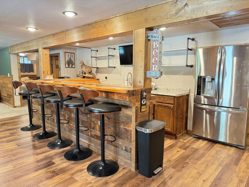Move right into this waterfront home on the Rhinelander flowage - photo 9