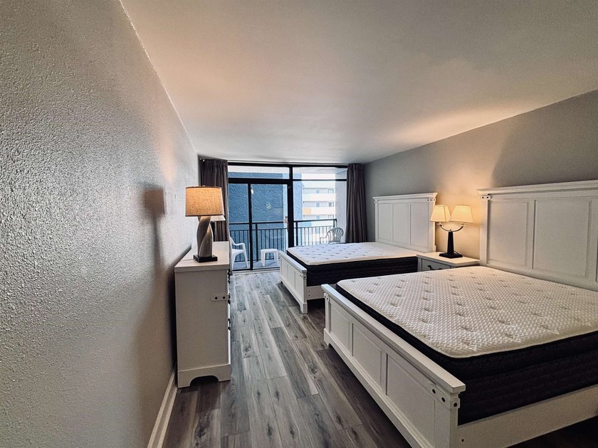Like-new and fully remodeled, this beautifully updated condo is - photo 3