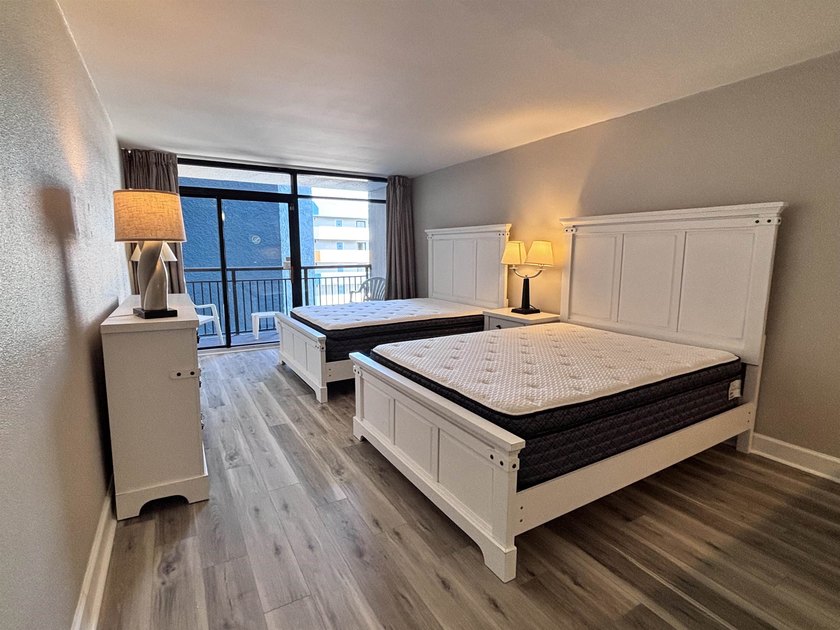Like-new and fully remodeled, this beautifully updated condo is - photo 4