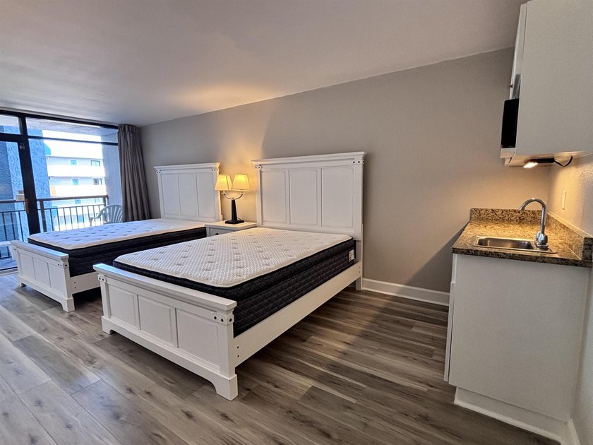 Like-new and fully remodeled, this beautifully updated condo is - photo 5