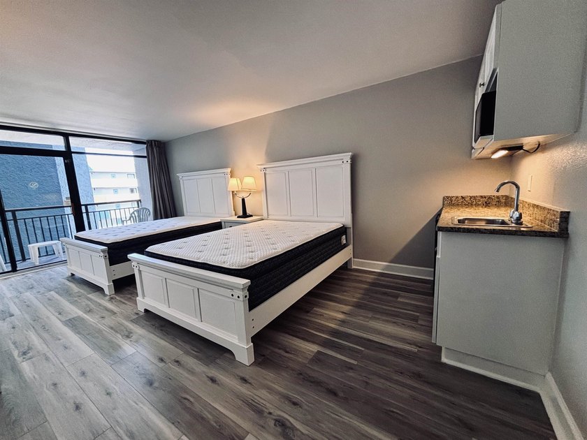 Like-new and fully remodeled, this beautifully updated condo is - photo 8