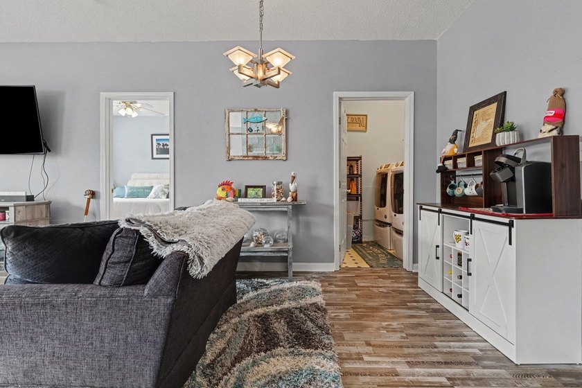 This updated second-floor, 3-bedroom, 2-bath condo overlooks the - photo 6