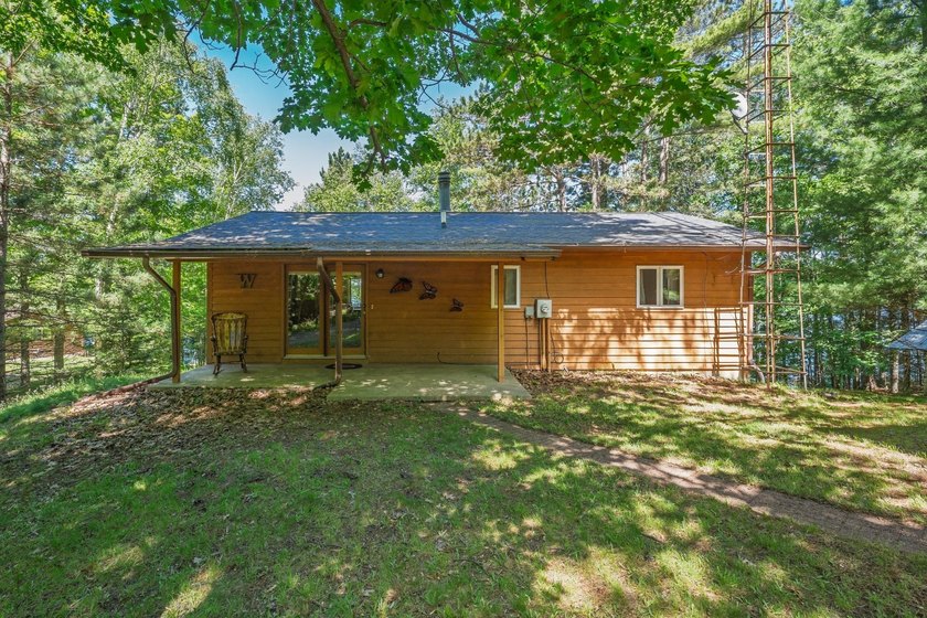 Northwoods home with western exposure and 100' of sand frontage - photo 2