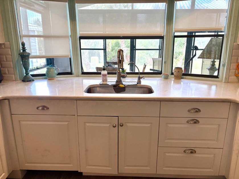 This home at 1239 North Indies Circle is perfectly situated in a - photo 11