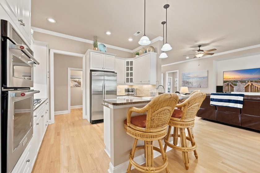 Experience luxury coastal living in the prestigious gated - photo 5