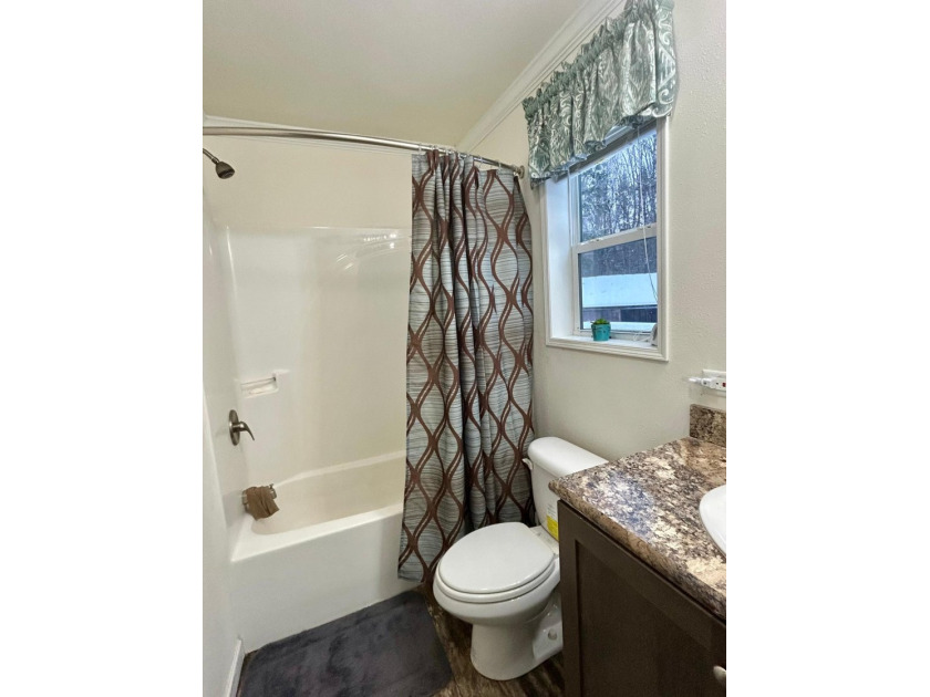 Here's your new UP NORTH Property! This 2 BR/1Bth, 2017 build - photo 9