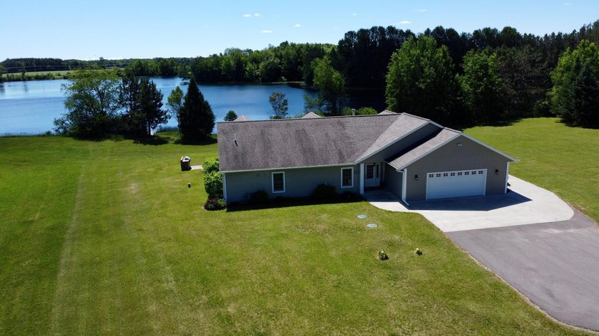 Pristine Hilger Lake living awaits! Nestled on 2 private acres - photo 2