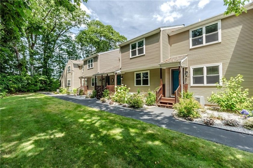 Step into this welcoming townhouse style unit located in - photo 2