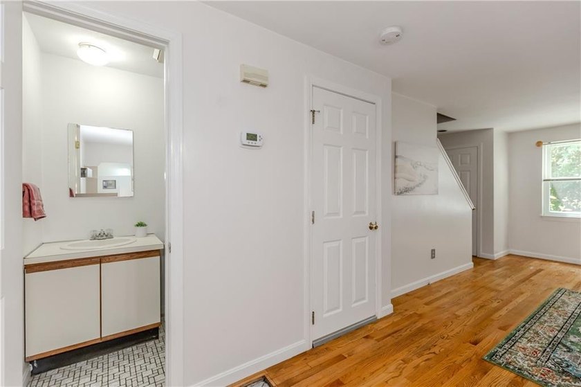 Step into this welcoming townhouse style unit located in - photo 8