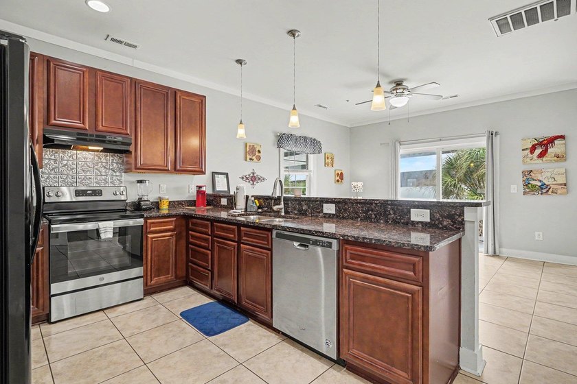 Enjoy coastal living in this raised beach home featuring 4 - photo 6