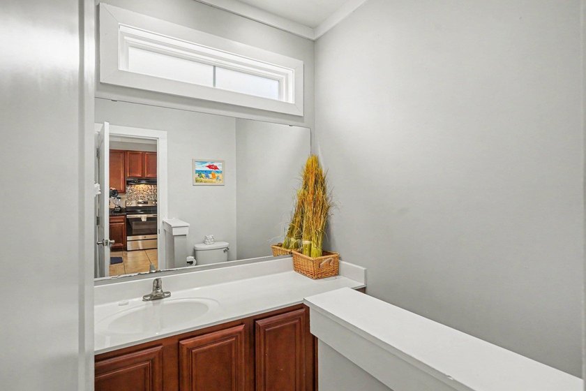 Enjoy coastal living in this raised beach home featuring 4 - photo 7