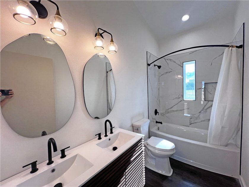 Discover modern design and effortless living in this stylish - photo 13