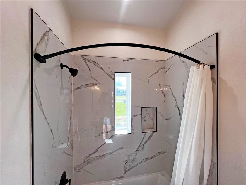 Discover modern design and effortless living in this stylish - photo 14