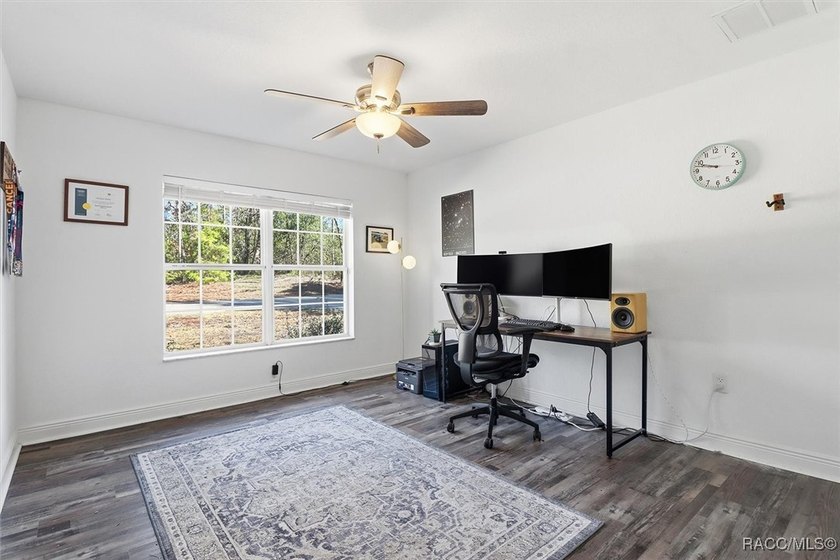 Welcome to this spacious 4-bedroom, 3 full bathroom home located - photo 30