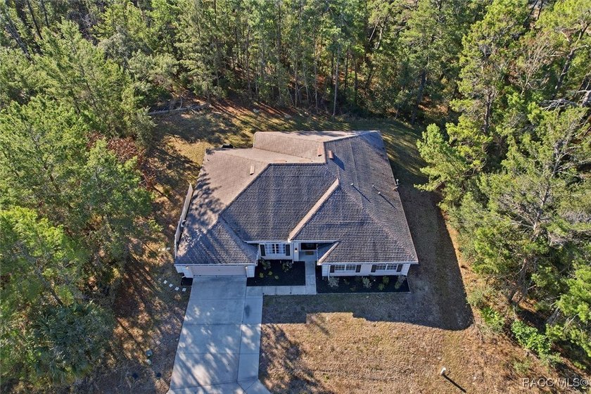 Welcome to this spacious 4-bedroom, 3 full bathroom home located - photo 35