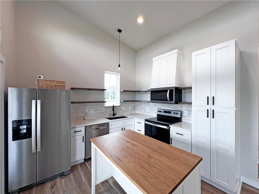 Welcome home to this beautifully designed newer construction - photo 11