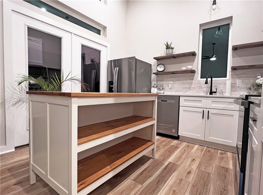 Welcome home to this beautifully designed newer construction - photo 12