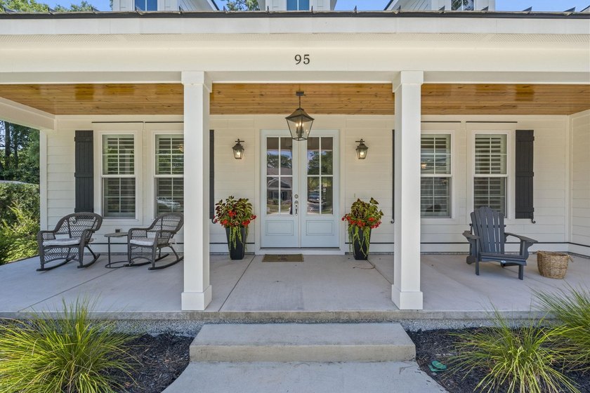 Built in 2023, this like-new home combines modern design - photo 3