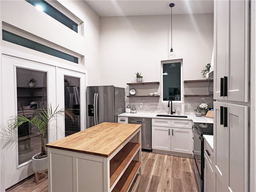 Welcome home to this beautifully designed newer construction - photo 13