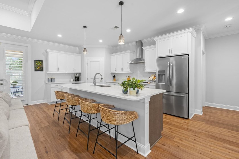 Built in 2023, this like-new home combines modern design - photo 6