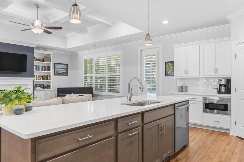 Built in 2023, this like-new home combines modern design - photo 7