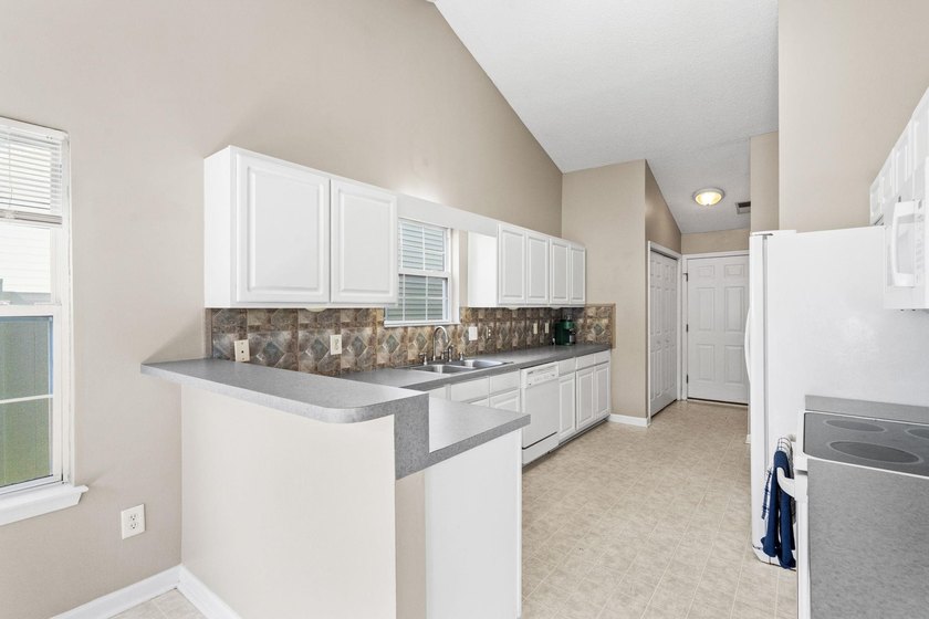 Welcome to this move-in ready 3-bedroom, 2-bath home in the - photo 10