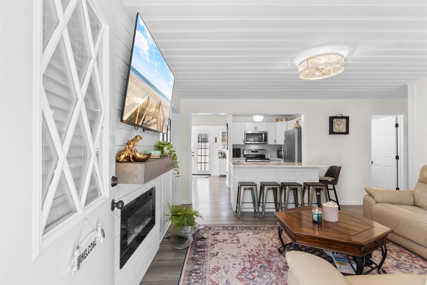 Your quintessential coastal retreat awaits. This immaculate - photo 2