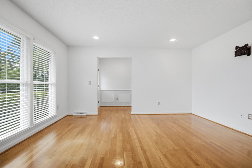 Situated on a spacious corner lot surrounded by mature trees - photo 3