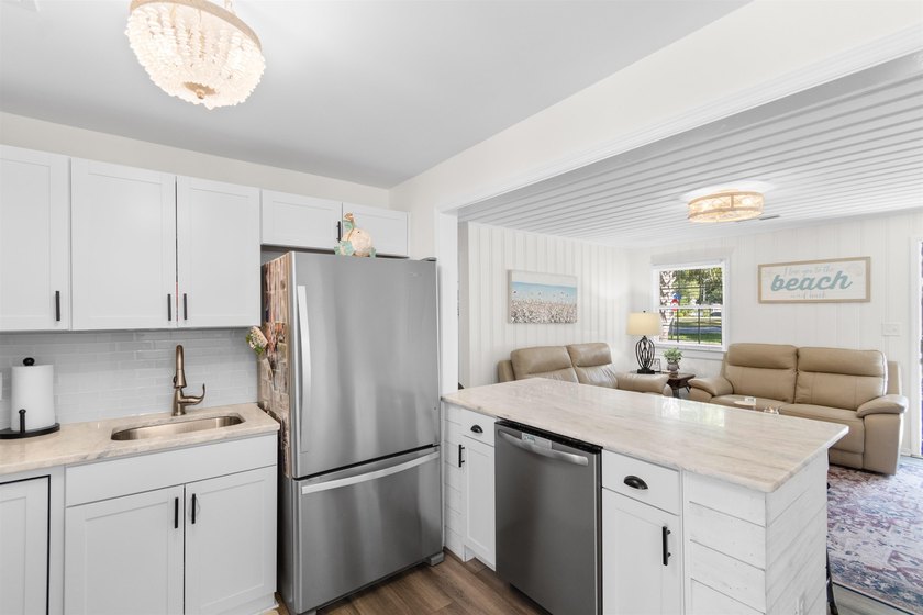 Your quintessential coastal retreat awaits. This immaculate - photo 5