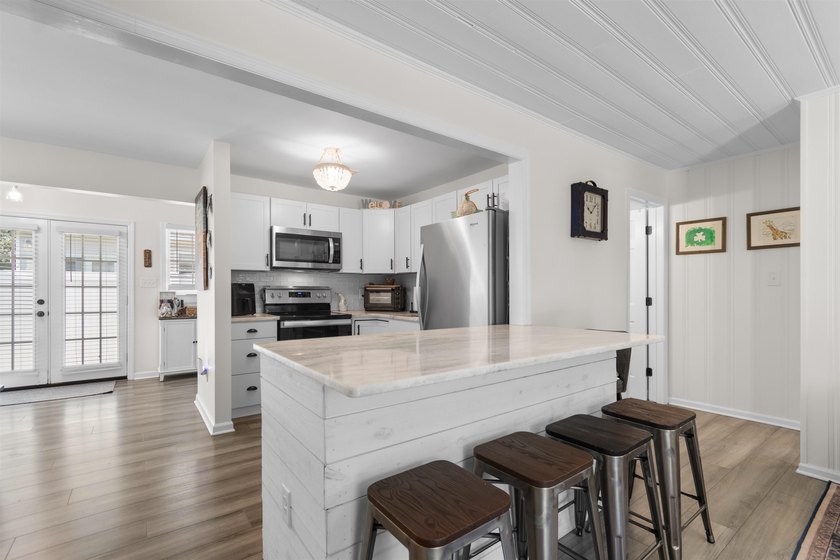 Your quintessential coastal retreat awaits. This immaculate - photo 8