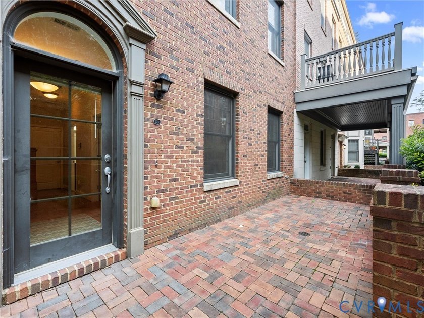 From the moment you stroll beneath the charming brick archway - photo 4
