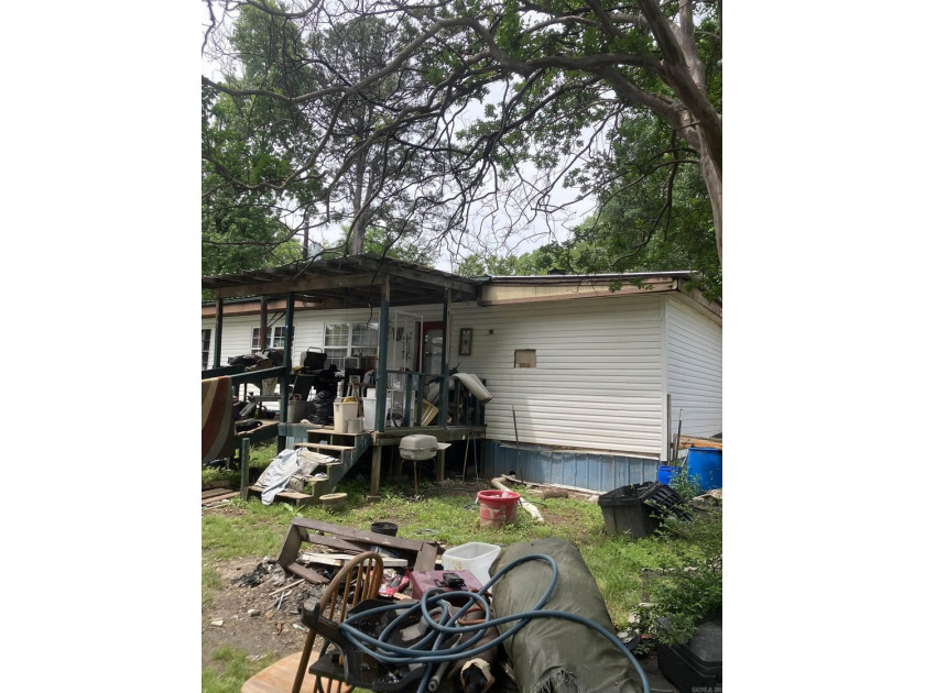 Tucked away on approximately 1 acre, this versatile manufactured - photo 3