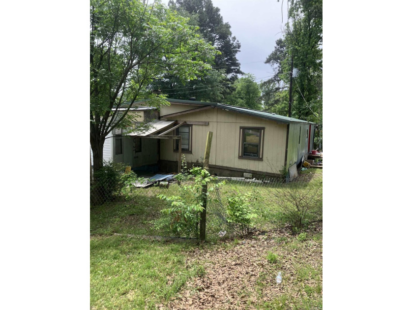 Tucked away on approximately 1 acre, this versatile manufactured - photo 5