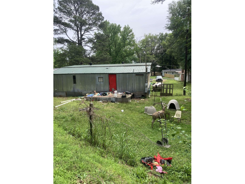 Tucked away on approximately 1 acre, this versatile manufactured - photo 7