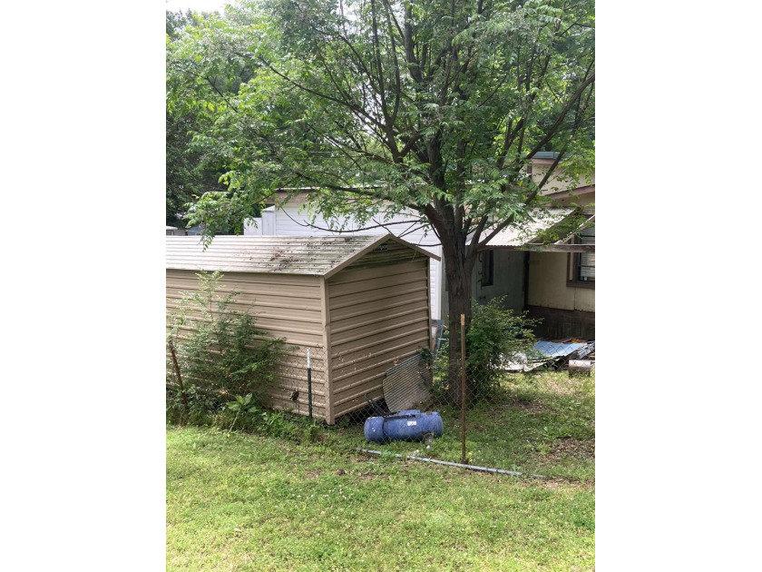 Tucked away on approximately 1 acre, this versatile manufactured - photo 8