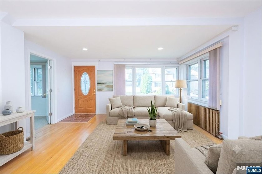 This income-producing two-family home lies in the heart of - photo 3