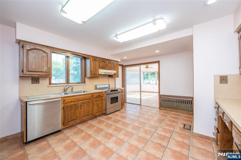 This income-producing two-family home lies in the heart of - photo 6