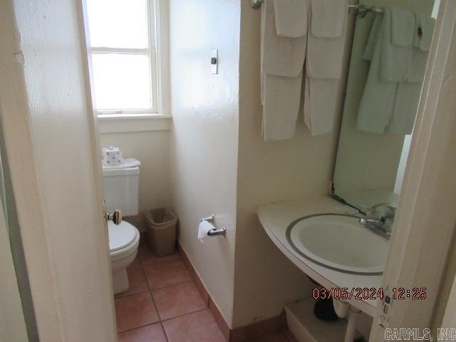This is currently operating as a motel, but more so as a - photo 10