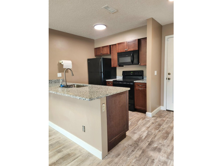 Rarely available, this beautifully updated third-floor condo - photo 3