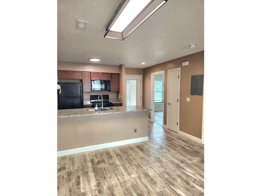 Rarely available, this beautifully updated third-floor condo - photo 4