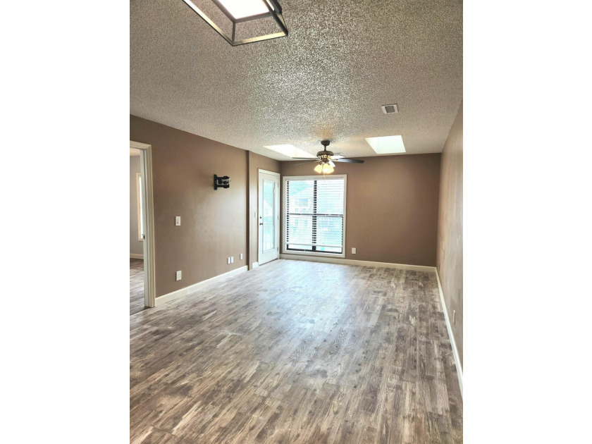 Rarely available, this beautifully updated third-floor condo - photo 7