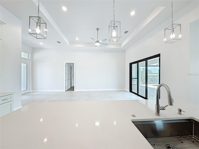 BRAND NEW WATERFRONT MASTERPIECE WITH GULF ACCESS. Welcome to - photo 12