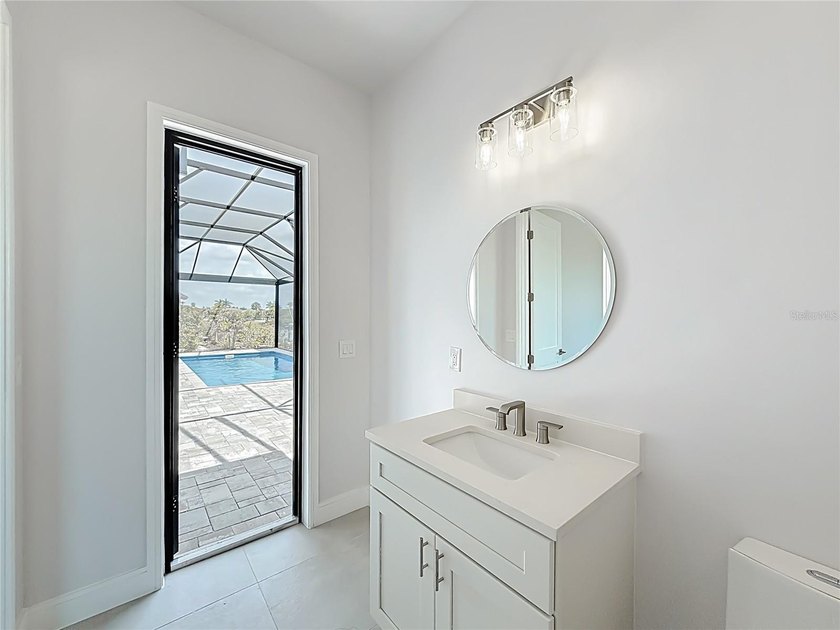 BRAND NEW WATERFRONT MASTERPIECE WITH GULF ACCESS. Welcome to - photo 22