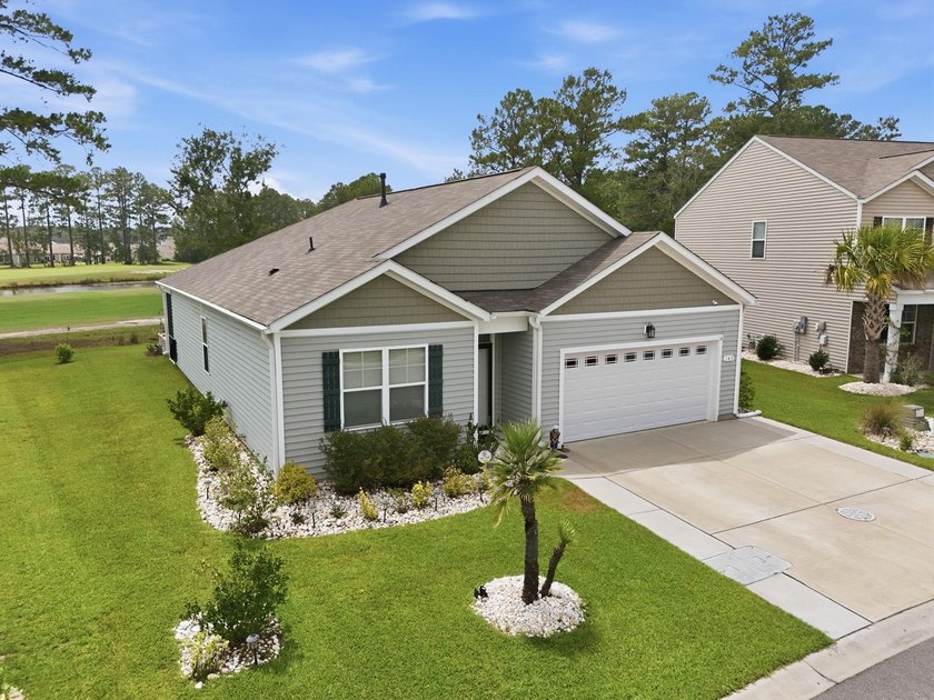 This Cali plan home at 143 Marauder Dr sits on a larger lot - photo 2