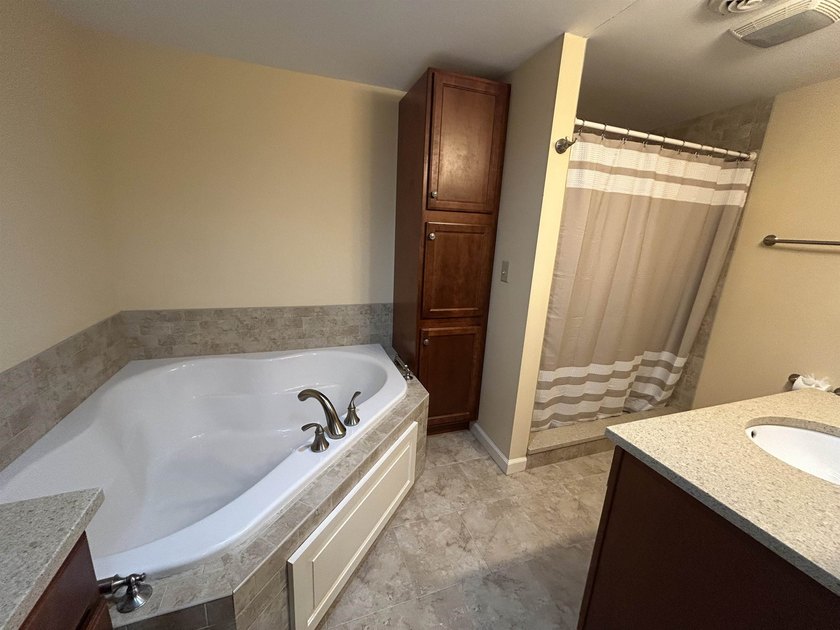 Welcome to this 2-bedroom condo nestled within the landmark - photo 16