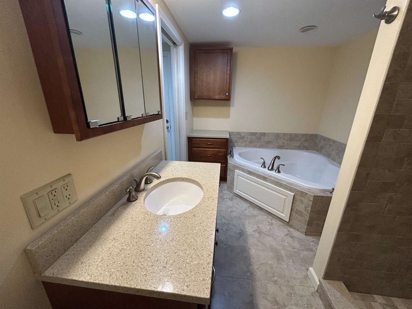 Welcome to this 2-bedroom condo nestled within the landmark - photo 17