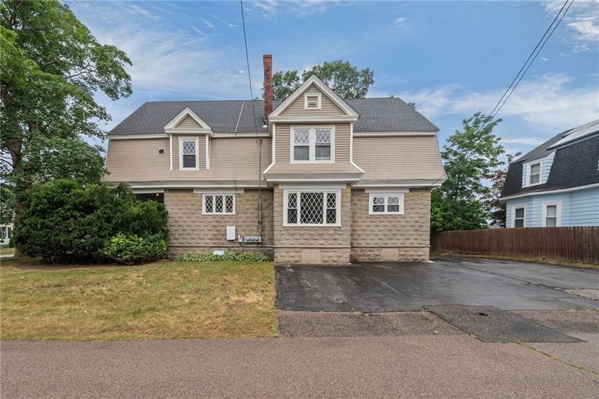 One of a kind Riverside three family offering exceptional - photo 2