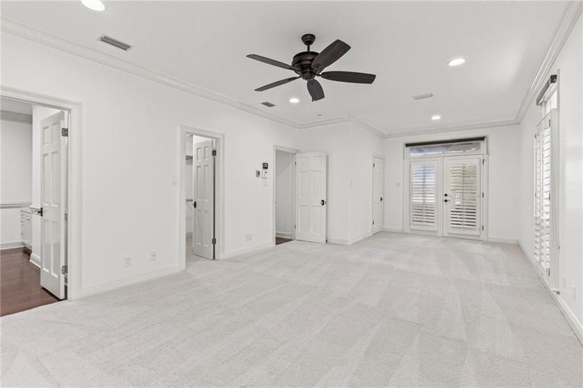 Private gated entrance, 4 sprawling acres, and 108 feet of lake - photo 17