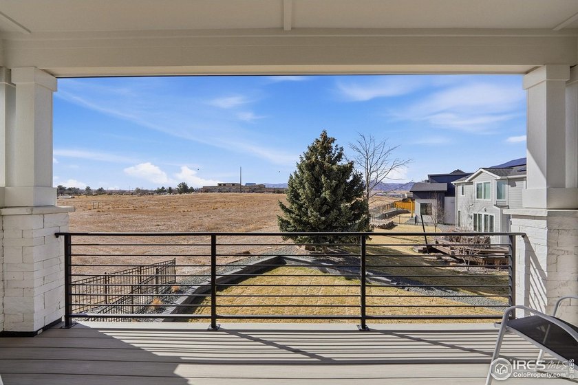 A new custom home backing to City open space with Flatiron views - photo 22